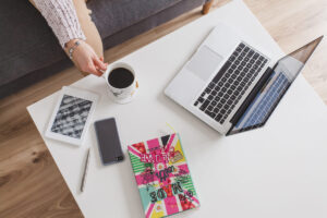Best side hustles in the UK and USA in 2026 showing online income ideas, laptop workspace and digital earning opportunities